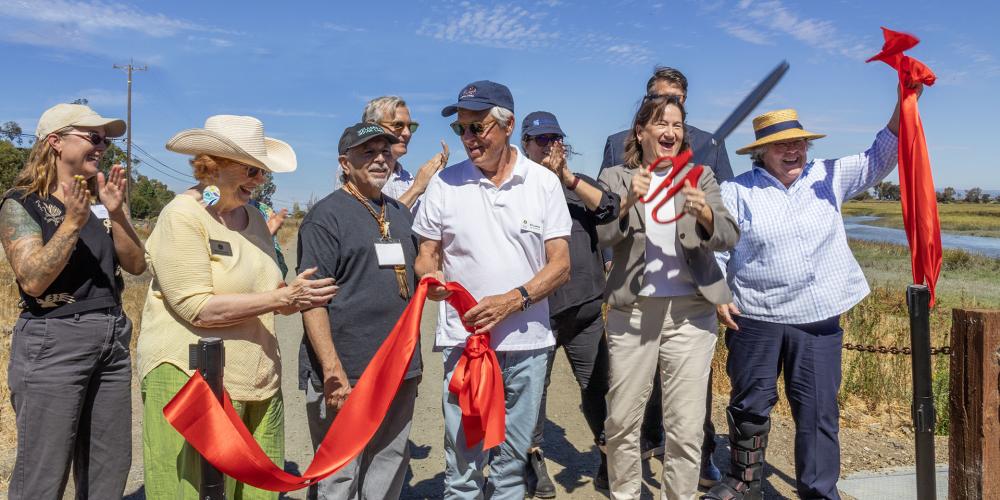 ABAG President Susan Adams and partners cut the ribbon at the Palo Alto Horizontal Levee event.