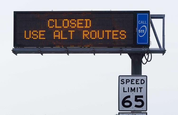 Closed, use alternate routes sign.